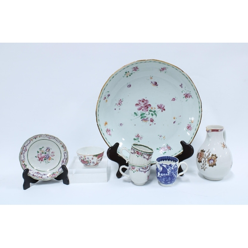 376 - A group of Chinese famille rose porcelain to include a plate, two cups, tea bowl, saucer and jug and... 