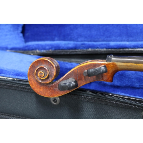 385 - Late 19th / early 20th century Medeo Fino violin with bow and case