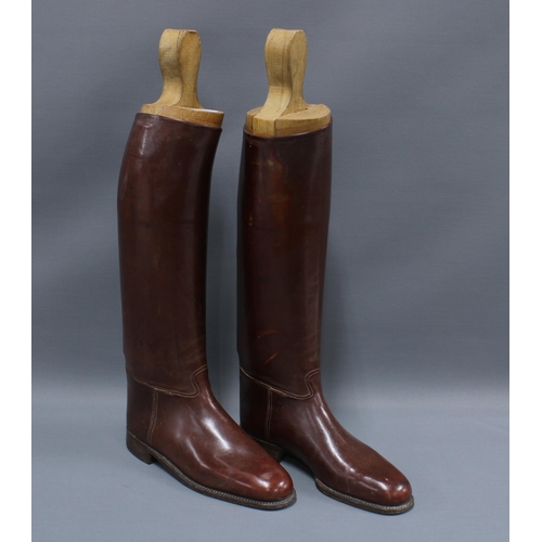 392 - Pair of brown leather riding boots by Berson, No. 13, with wooden boot trees