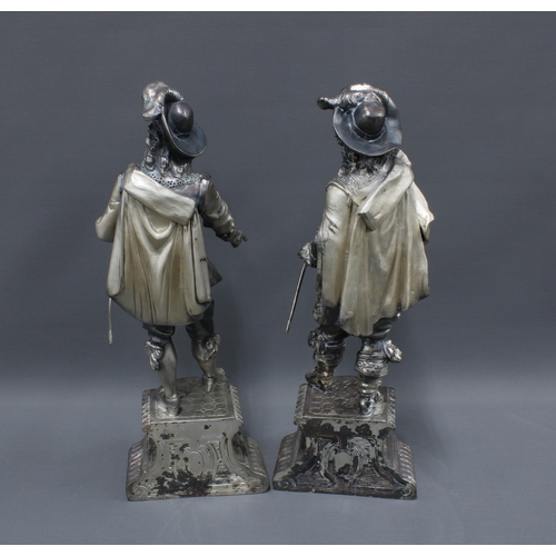 398 - Pair of silvered composite Cavelier figures, height 53cm (2)