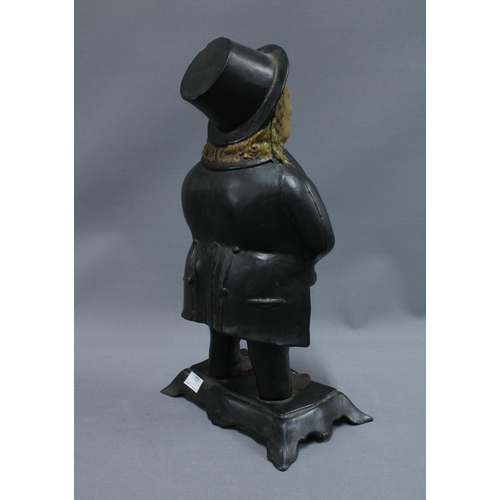 408 - Figural spelter clock with moving eyes, 38cm