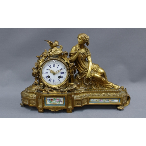 409 - French mantle clock the ormolu case with classical female figure and birds, enamel dial with roman n... 