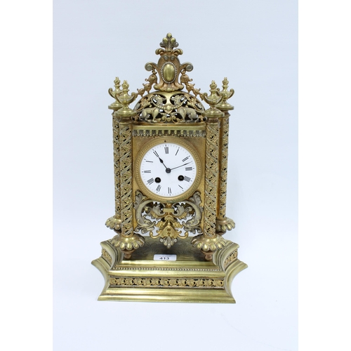 413 - Gilt metal mantle clock, the enamel dial flanked by pierced pilasters, brass movement numbered 7791,... 