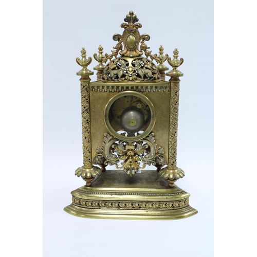 413 - Gilt metal mantle clock, the enamel dial flanked by pierced pilasters, brass movement numbered 7791,... 