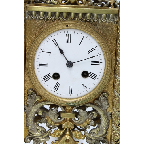 413 - Gilt metal mantle clock, the enamel dial flanked by pierced pilasters, brass movement numbered 7791,... 