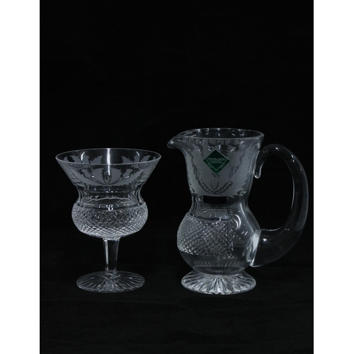 414 - A part suite of Edinburgh Crystal thistle etched glass to include a decanter and stopper, small wate... 