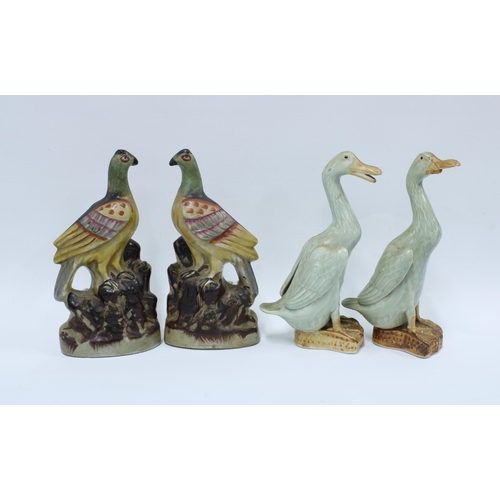 420 - Pair of pottery pheasant figures and a pair of celadon glazed ducks, (one a/f) 25cm (4)