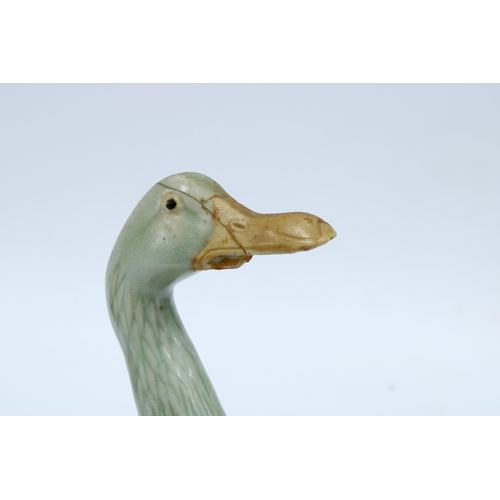 420 - Pair of pottery pheasant figures and a pair of celadon glazed ducks, (one a/f) 25cm (4)