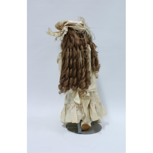 423 - Early 20th century Armand Marseille bisque head doll, AM370, 52cm long