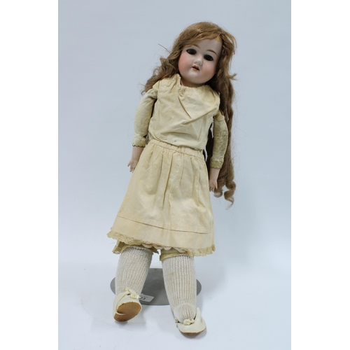 423 - Early 20th century Armand Marseille bisque head doll, AM370, 52cm long