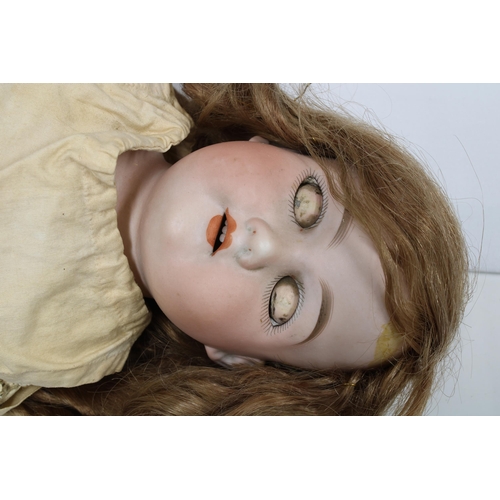 423 - Early 20th century Armand Marseille bisque head doll, AM370, 52cm long