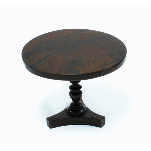 450 - Miniature rosewood tea table on triform platform base, height 10cm