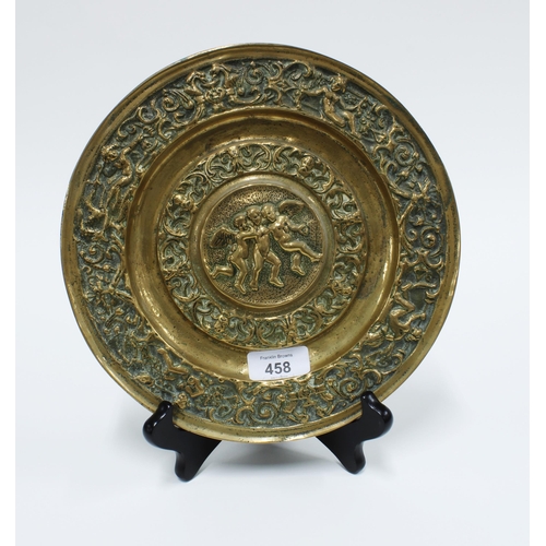 458 - Heavy brass cherub pattern dish, 25cm diameter