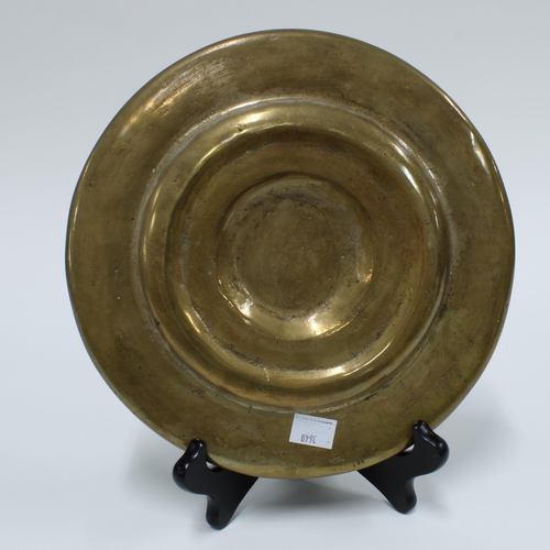 458 - Heavy brass cherub pattern dish, 25cm diameter