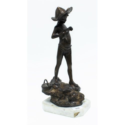 459 - Bronze figure of a boy with a fish, on a naturalistic mound and octagonal hardstone base, 42cm