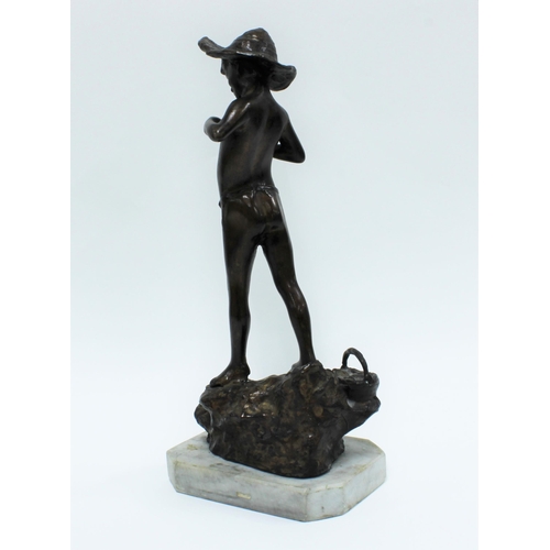 459 - Bronze figure of a boy with a fish, on a naturalistic mound and octagonal hardstone base, 42cm