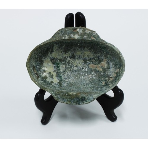 462 - Chinese green glazed Ear Cup of oval form, flanked by elongated ear handles, 12cm long