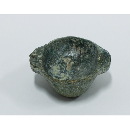 462 - Chinese green glazed Ear Cup of oval form, flanked by elongated ear handles, 12cm long