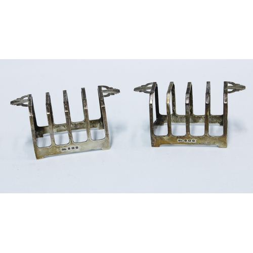 56 - Pair of Birmingham silver toast racks by Deakin & Francis and a cased set of two Birmingham silver b... 