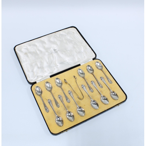 62 - Cased set of twelve Walker & Hall silver teaspoons and matching sugar tongs, Sheffield 1936