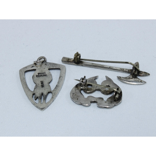 74 - Two Ian McCormick Iona silver brooches and a Gilmour & Watson Iona silver pendant (3)