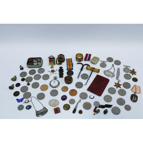 76 - A quantity of miscellaneous WWII medals, coins, commemorative coins, vesta case, corkscrews and enam... 