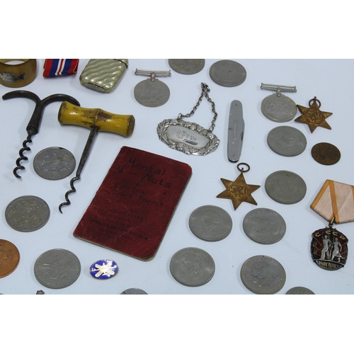 76 - A quantity of miscellaneous WWII medals, coins, commemorative coins, vesta case, corkscrews and enam... 