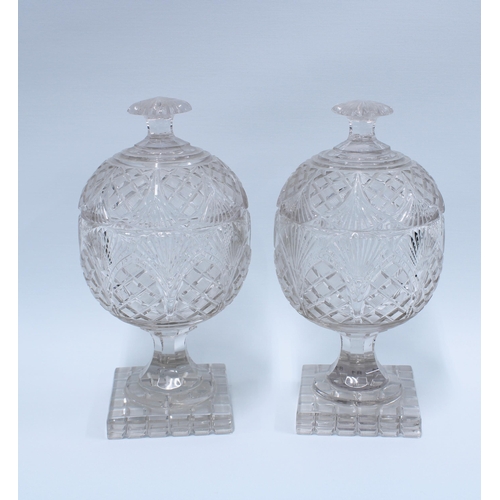 81 - A pair of cut glass confitures with covers, on square bases, (2) 25 x 13cm