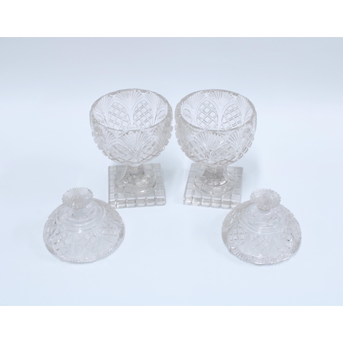 81 - A pair of cut glass confitures with covers, on square bases, (2) 25 x 13cm