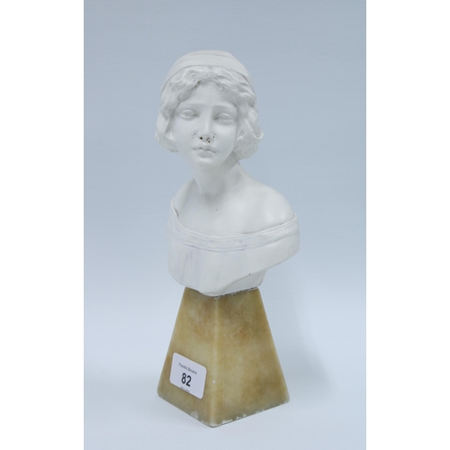 82 - White painted head and shoulders bust, on a a faux hardstone base, 24cm high.