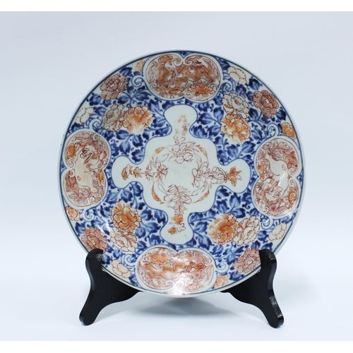 86 - Chinese plate with underglaze blue pattern and with iron red carnations and other flowers, further d... 