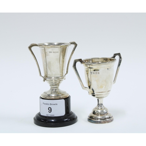 9 - Two small silver Royal Bank Golf Club trophy cups, and one ebonised base, taller 8cm (2)