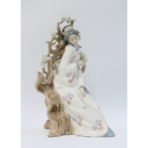 97 - Lladro porcelain figure of a Geisha beneath a prunus tree, 30cm.