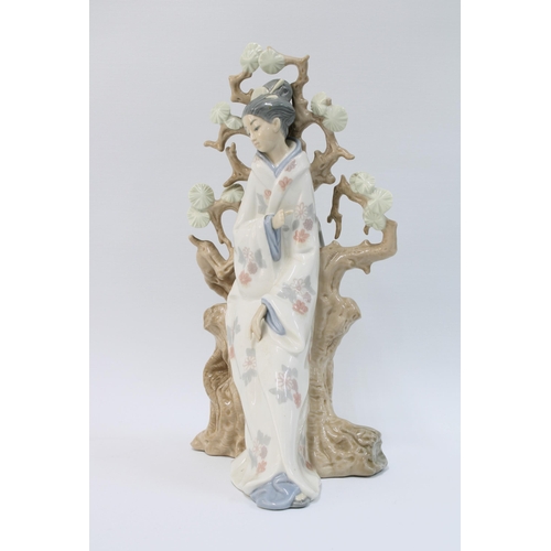 97 - Lladro porcelain figure of a Geisha beneath a prunus tree, 30cm.