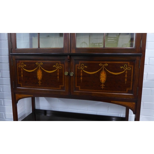 276 - Edwardian rosewood and marquetry display cabinet with a stepped cornice over a pair of astragal glaz... 