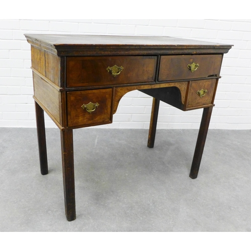 277 - Georgian oak and walnut veneered lowboy, the rectangular top over four frieze drawers with brass han... 