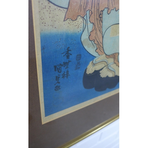 5 - A hashira-e pillar print, signed Kunisada, framed under glass, 25 x 75cm