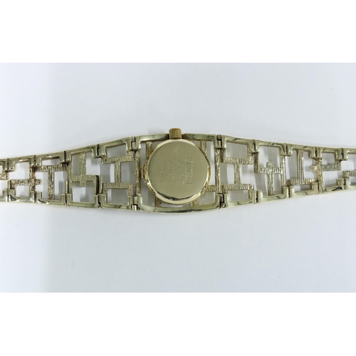 12 - Lady's vintage 15ct gold ZentRa wrist watch with circular dial and hour batons, on a pierced and tex... 