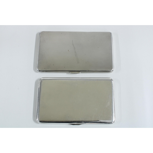 23 - George VI silver cigarette case, 14 x 8.5cm and a silver plate cigarette case with niello style fron... 