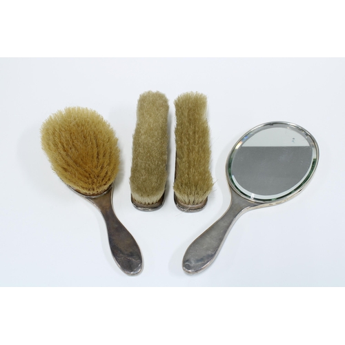 25 - George V silver and tortoiseshell four piece dressing table brush set London 1919 (4)