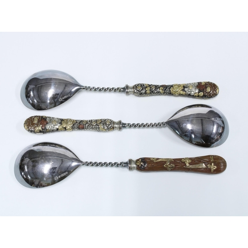 47 - Three Elkington & Co spoons with Japonism handles, 21cm (3)