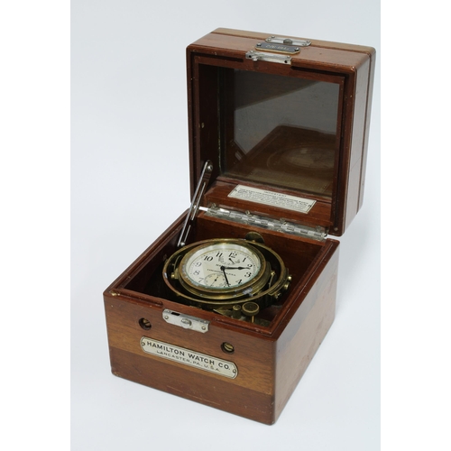 63 - Hamilton Watch Company chronometer watch, model 22, in mahogany case, numbered 276-1943, case 15 x 1... 