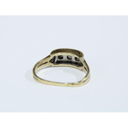 7 - Yellow metal ring with three claw set diamonds, band misshapen (a/f)