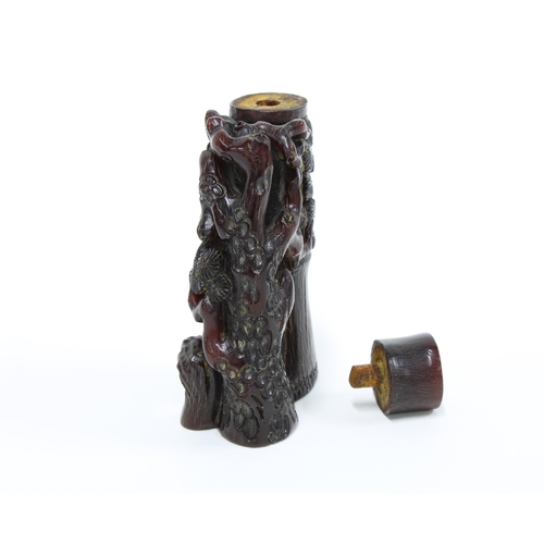 112 - Carved Chinese horn snuff bottle and cover formed as bamboo and pine, 9cm high