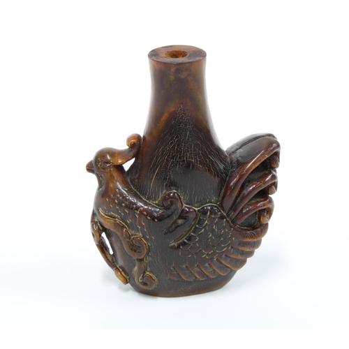 113 - Carved Chinese horn snuff bottle formed as a phoenix, 6.5cm