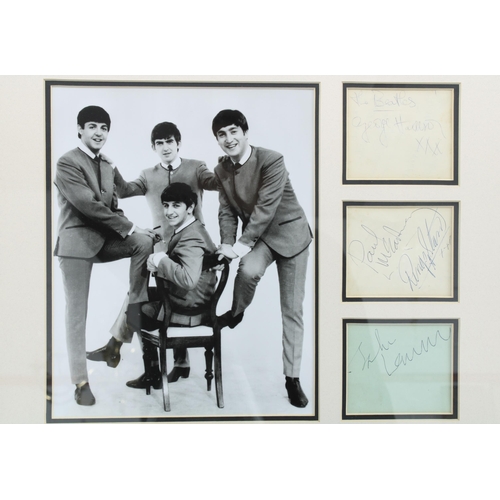 118 - The Beatles, framed black and white image together with a group of blue ink signatures on paper toge... 