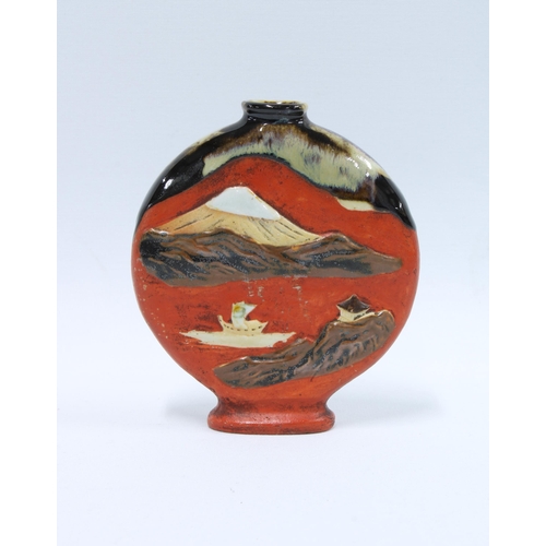 131 - Japanese Sumida Gawa type vase of flask form  decorated with two figures, one playing a flute the ot... 