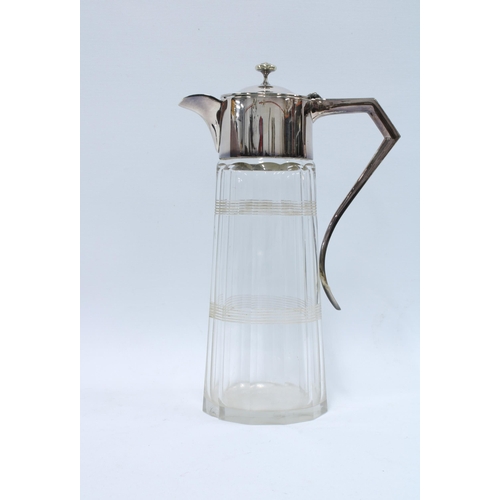 158 - Early 20th century glass claret jug with silver plated mounts 28cm.