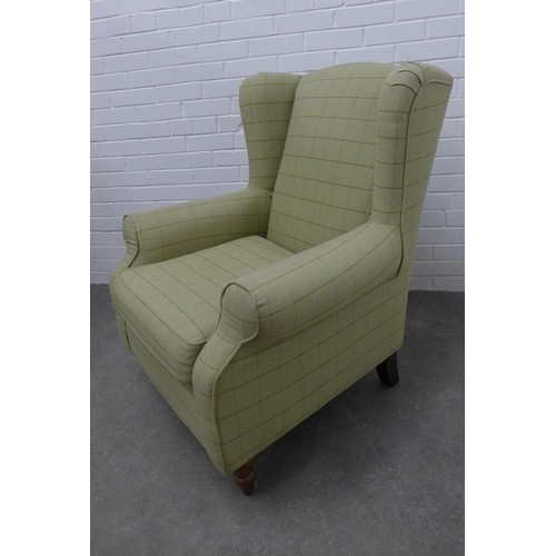 206 - Wing armchair upholstered with a stylish pale green chequered wool fabric, on wooden legs, 102 x 88 ... 