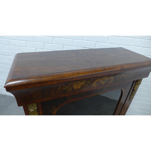 208 - 19th century walnut and ormolu mounted pier cabinet with a glazed door and shelved interior, 109 x 8... 